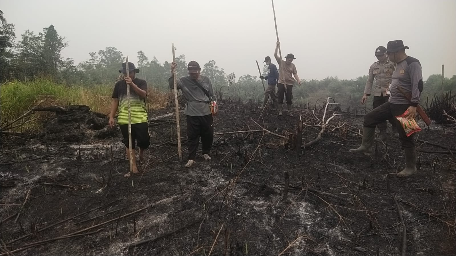 Polsek Ketungau Hulu Dampingi Penanaman Jagung Hibrida di Lahan 3 Hektare